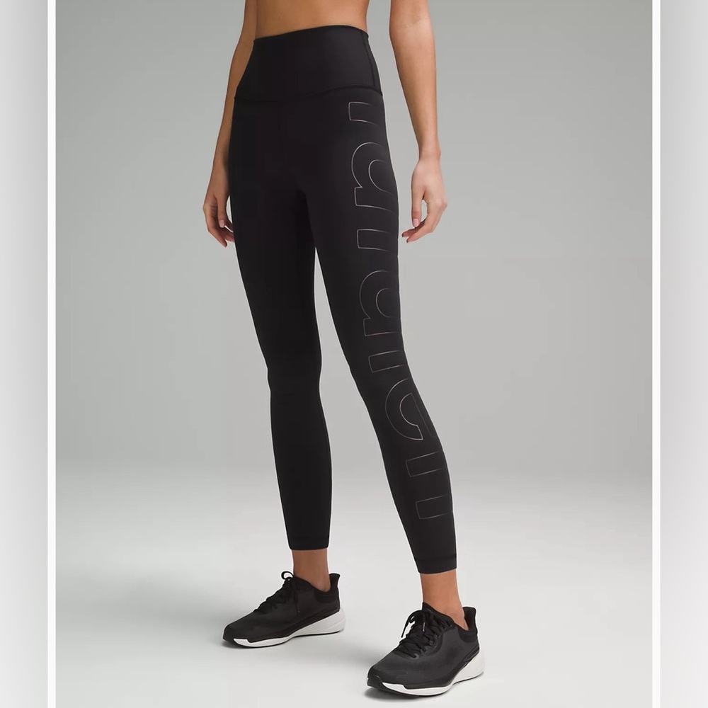 - Wunder Train High-Rise Tight 25"
Graphic